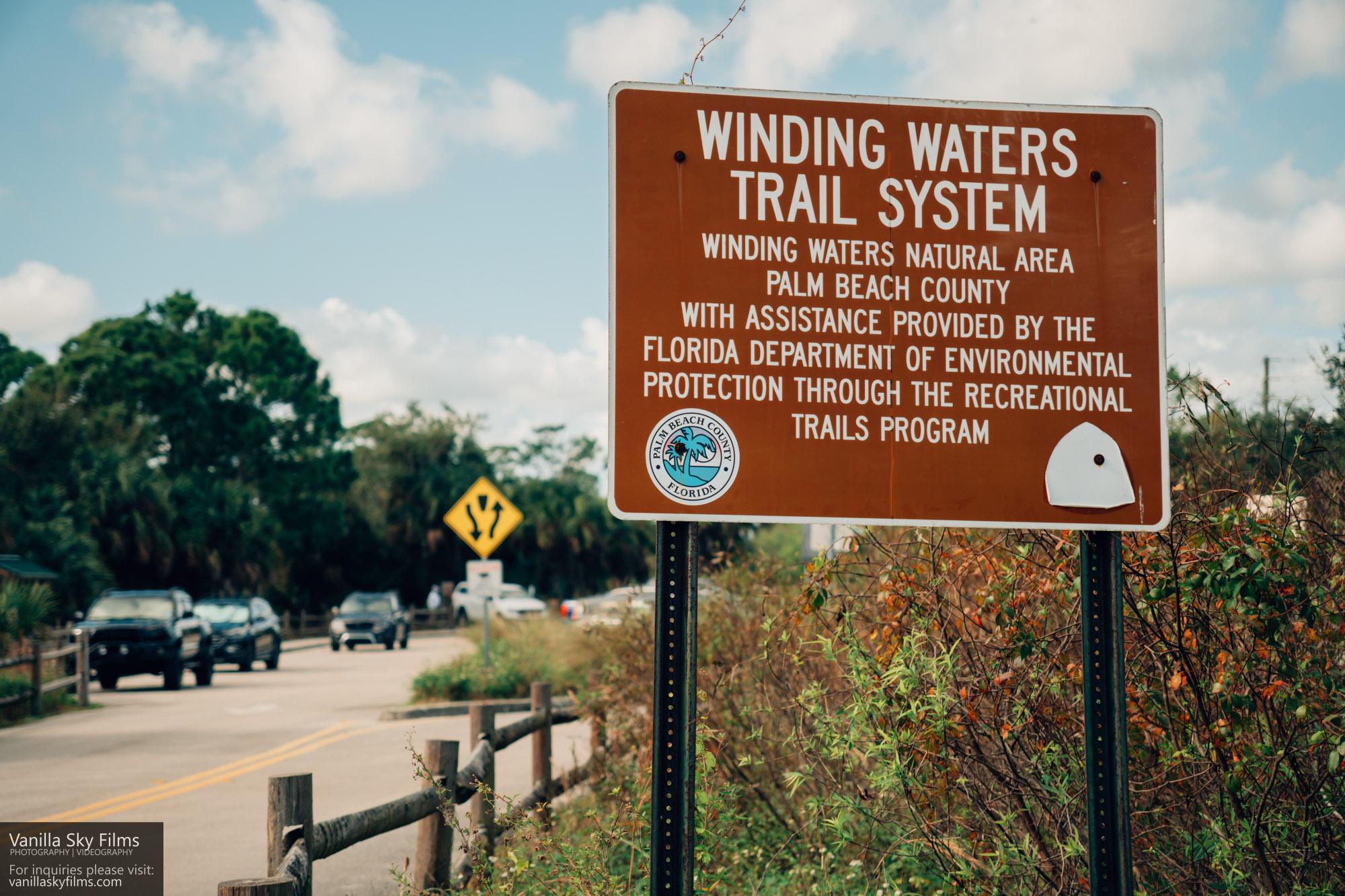 Winding waters trail system entry sign and parking place